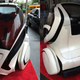 Illustration for article titled Could GMs Tiny Self-Driving Smartcar Actually Revolutionize Cities?